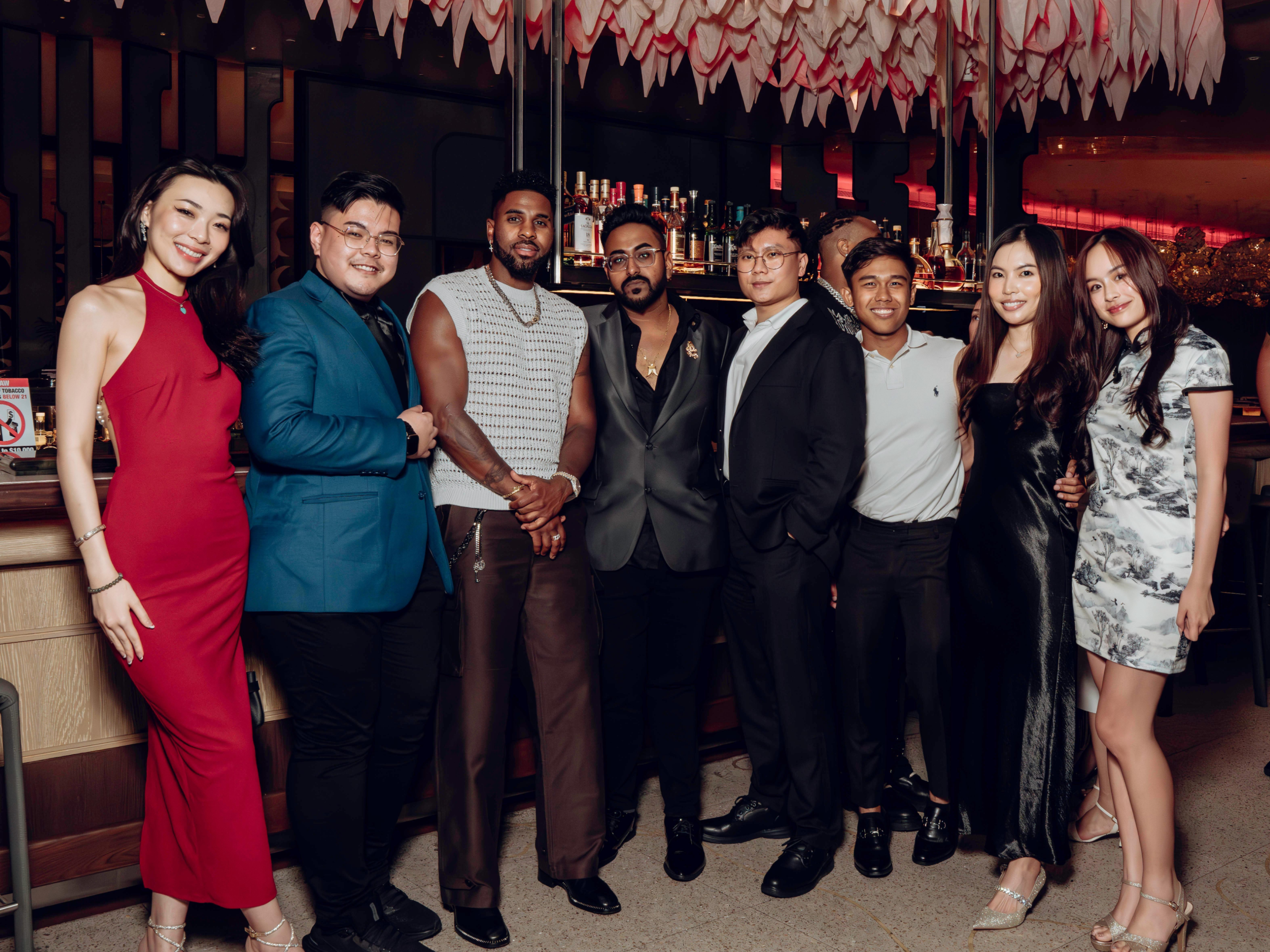 APEX AURA members gathered at an evening event