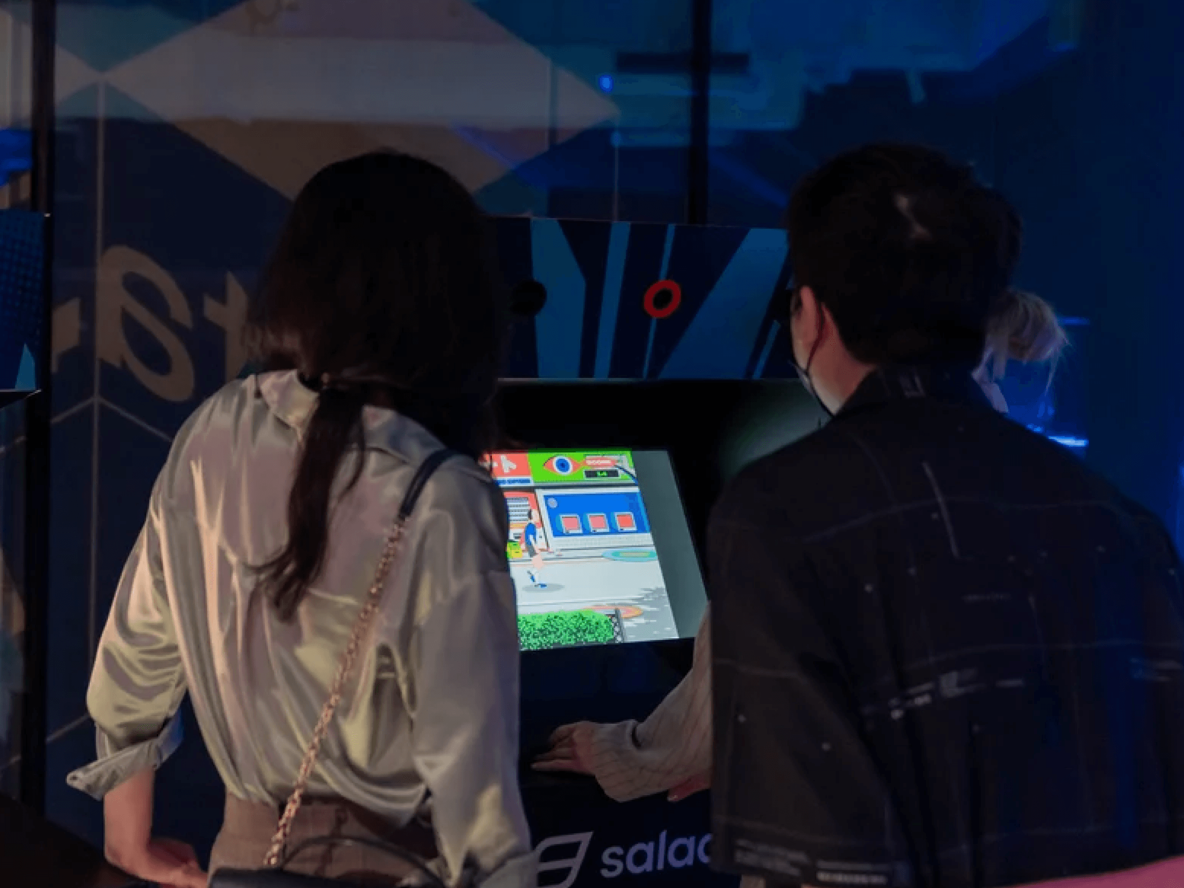Guests exploring an interactive digital exhibit