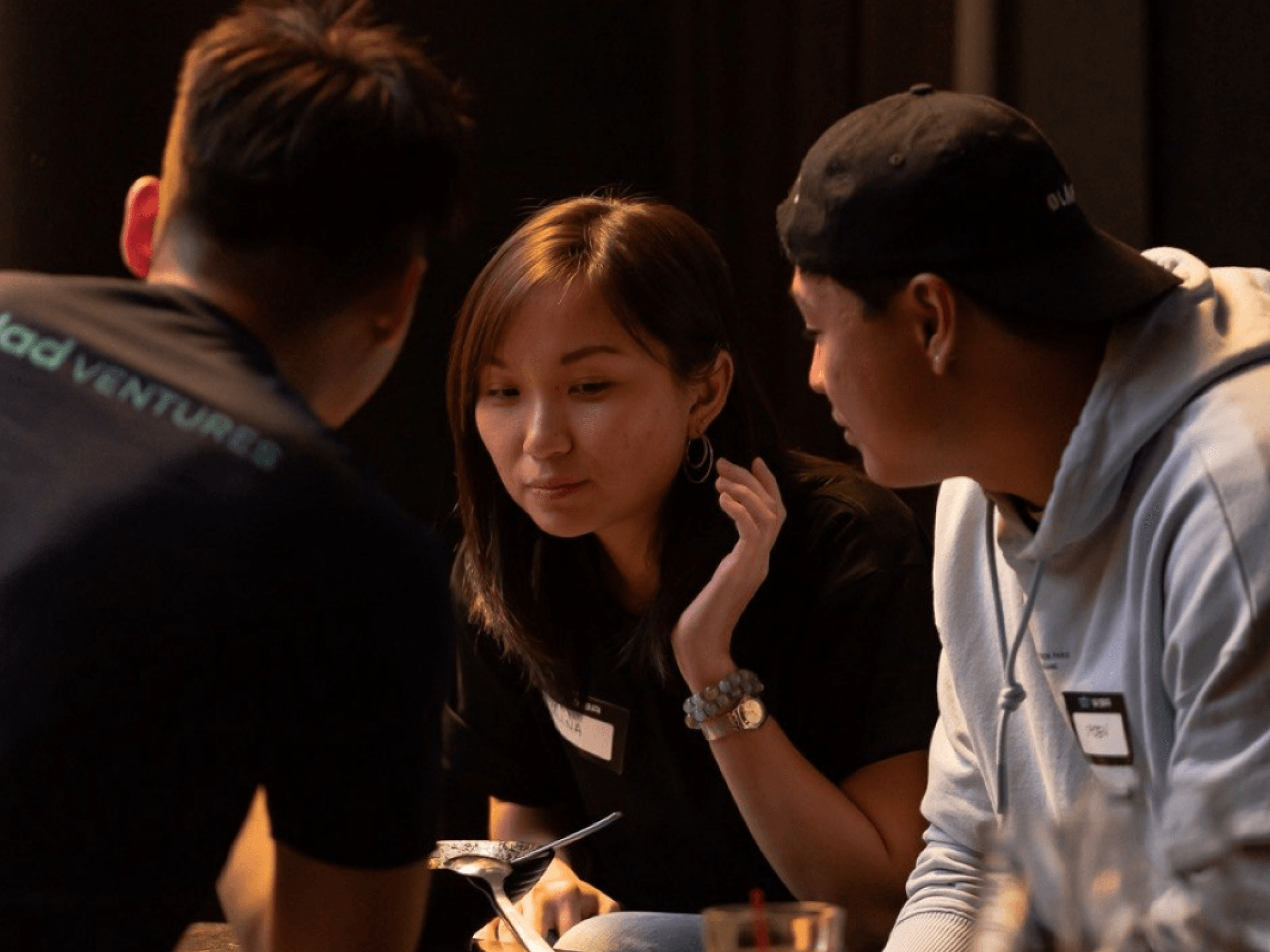 W3A guests in conversation around a table