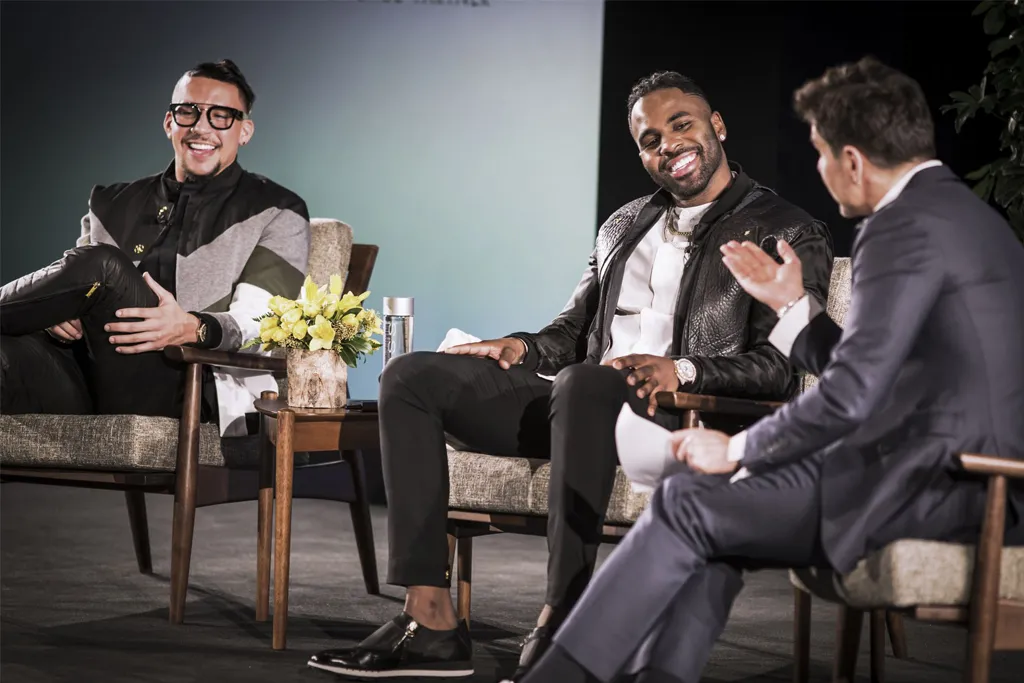 Artists in conversation during a live interview